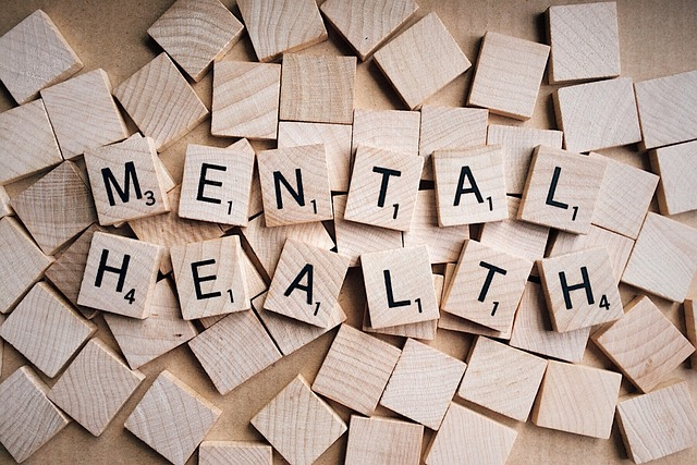 Wooden Scrabble tiles spelling Mental Health